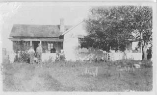 George and Willis in front of Glessner Homestead abt. 1920