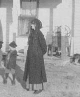 Madge & Willis in front of Madge's washing machine. Abt. 1910